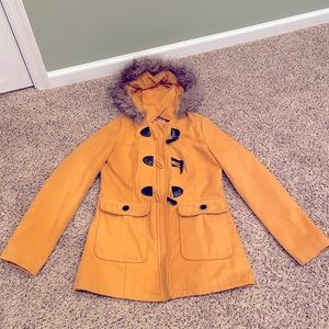 Mustard yellow jacket with fur trim hood